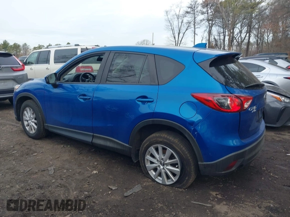 2013 Mazda CX-5 Touring with VIN JM3KE4CE0D0160711, listed as a IAAI auction lot 41843658 with 65,391 mi miles. Bid and sale history available at carsss.com. Image 14.