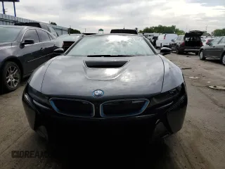 2015 BMW i8 z VIN WBY2Z2C54FV392511, wystawiony jako Copart lot #53033563 z przebiegiem 51 024 mil mil oraz . Historia ofert i sprzedaży dostępna na DreamBid. Obrazek 5.