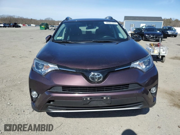 2018 Toyota RAV4 XLE with VIN 2T3RFREVXJW851654, listed as a Copart auction lot 48961055 with 166,664 mi miles and Salvage Title. Bid and sale history available at DreamBid. Image 5.
