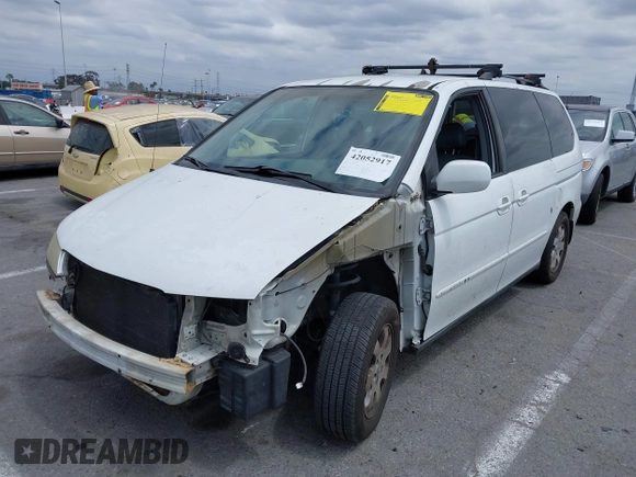2003 Honda Odyssey EX-L with VIN 5FNRL18973B113215, listed as a IAAI auction lot 42052917 with Not Provided miles and . Bid and sale history available at DreamBid. Image 2.