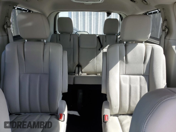 2015 Chrysler Town & Country Touring L with VIN 2C4RC1CGXFR547823, listed as a Copart auction lot 56233135 with 230,728 mi miles and Clean Title. Bid and sale history available at DreamBid. Image 10.