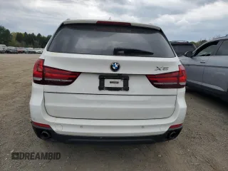 2015 BMW X5 xDrive35d z VIN 5UXKS4C59F0N08203, wystawiony jako Copart lot #54010775 z przebiegiem 99 425 mil mil oraz Szkoda całkowita • Salvage title. Historia ofert i sprzedaży dostępna na DreamBid. Obrazek 6.
