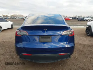 2023 Tesla Model Y Long Range with VIN 7SAYGDEE6PF947827, listed as a IAAI auction lot 41443524 with 12,381 mi miles and . Bid and sale history available at DreamBid. Image 16.