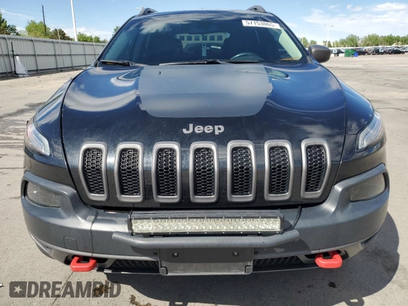 2014 Jeep Cherokee Trailhawk z VIN 1C4PJMBS1EW239692, wystawiony jako Copart lot #57153065 z przebiegiem 111 899 mil mil oraz Szkoda całkowita • Salvage title. Historia ofert i sprzedaży dostępna na DreamBid. Obrazek 5.