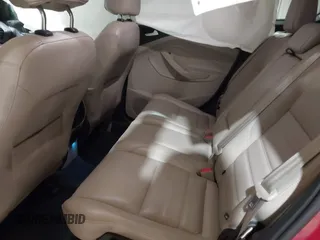 2017 Ford Escape Titanium z VIN 1FMCU9J9XHUC20359, wystawiony jako IAAI lot #41938688 z przebiegiem 79 743 mil mil oraz . Historia ofert i sprzedaży dostępna na DreamBid. Obrazek 8.