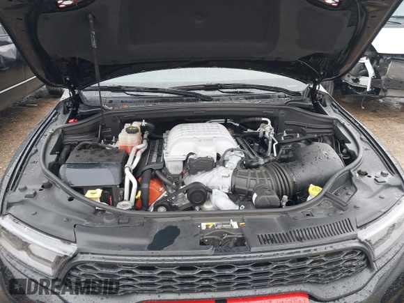 2023 Dodge Durango SRT Hellcat Premium with VIN 1C4SDJH99PC584770, listed as a IAAI auction lot 41562157 with 14,598 mi miles and . Bid and sale history available at DreamBid. Image 10.