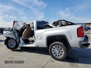 2018 GMC Sierra 2500HD Denali z VIN 1GT12UEYXJF225397, wystawiony jako Copart lot #87736565 z przebiegiem Nie podano mil oraz Nie do naprawy • Non repairable. Historia ofert i sprzedaży dostępna na DreamBid. Obrazek 2.