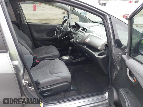 2009 Honda Fit with VIN JHMGE88279S055565, listed as a IAAI auction lot 41896359 with 184,618 mi miles. Bid and sale history available at carsss.com. Image 5.