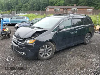 2016 Honda Odyssey Touring Elite with VIN 5FNRL5H90GB061827, listed as a Copart auction lot 61271695 with Not provided miles and Salvage title. Bid and sale history available at DreamBid. Image 1.