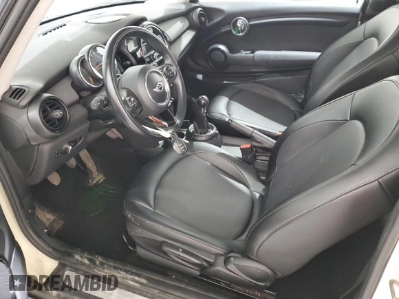 2015 MINI Hardtop with VIN WMWXM5C58FT973235, listed as a Copart auction lot 49988015 with 119,683 mi miles and Salvage Title. Bid and sale history available at DreamBid. Image 7.