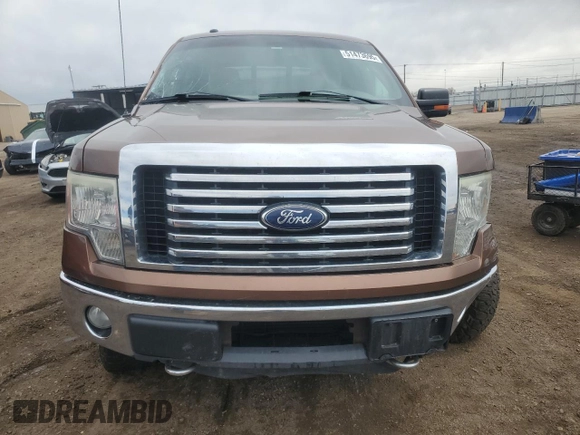 2011 Ford F-150 XLT with VIN 1FTFW1ETXBFB51042, listed as a Copart auction lot 51473695 with 179,195 mi miles and Salvage Title. Bid and sale history available at carsss.com. Image 5.