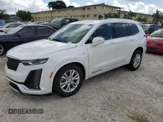 2024 Cadillac XT6 FWD Luxury with VIN 1GYKPAR4XRZ746989, listed as a Copart auction lot 77325614 with 2,234 mi miles and Salvage Title. Bid and sale history available at carsss.com. Image 1.