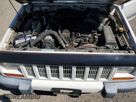 2000 Jeep Cherokee with VIN 1J4FF48S6YL169224, listed as a Copart auction lot 64411145 with 237,553 mi miles and Clean title. Bid and sale history available at DreamBid. Image 12.