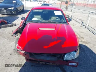 2001 Ford Mustang Standard z VIN 1FAFP40441F122154, wystawiony jako IAAI lot #41866131 z przebiegiem 214 865 mil mil oraz . Historia ofert i sprzedaży dostępna na DreamBid. Obrazek 13.