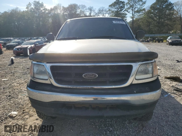 2003 Ford F-150 XL with VIN 1FTRX18L13NB64579, listed as a Copart auction lot 49496705 with 258,499 mi miles and Salvage Title. Bid and sale history available at carsss.com. Image 5.