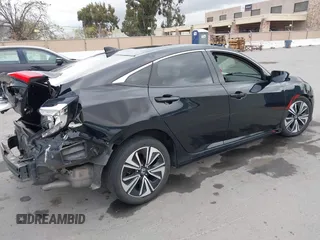2016 Honda Civic Sedan EX-L with VIN 19XFC1F72GE217515, listed as a IAAI auction lot 41893795 with 130,703 mi miles. Bid and sale history available at carsss.com. Image 4.