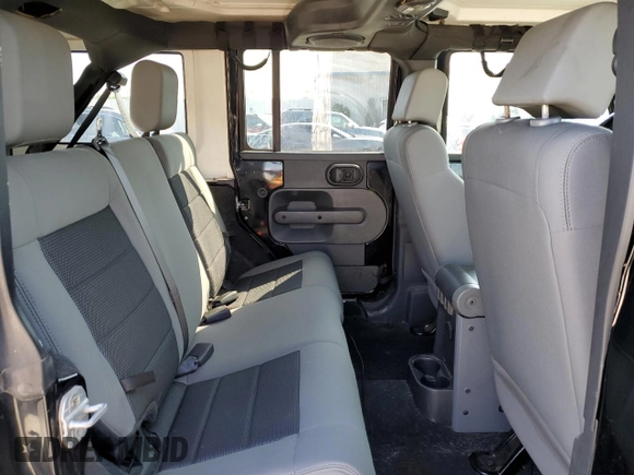 2008 Jeep Wrangler Unlimited X z VIN 1J4GA39128L518897, wystawiony jako Copart lot #52297525 z przebiegiem 163 676 mil mil oraz Nie do naprawy • Non repairable. Historia ofert i sprzedaży dostępna na DreamBid. Obrazek 10.