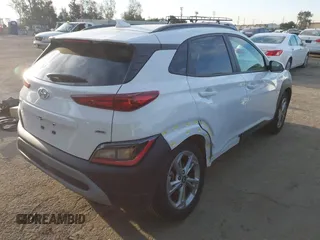 2023 Hyundai Kona SEL with VIN KM8K3CAB8PU055554, listed as a IAAI auction lot 41828652 with 11,323 mi miles and . Bid and sale history available at DreamBid. Image 4.
