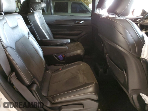 2023 Jeep Grand Cherokee Altitude with VIN 1C4RJJAGXP8856505, listed as a Copart auction lot 52243505 with 31,422 mi miles and Salvage title. Bid and sale history available at DreamBid. Image 12.