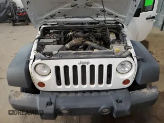 2011 Jeep Wrangler Sport with VIN 1J4AA2D12BL555530, listed as a Copart auction lot 42049915 with 83,349 mi miles and Salvage Title. Bid and sale history available at carsss.com. Image 11.