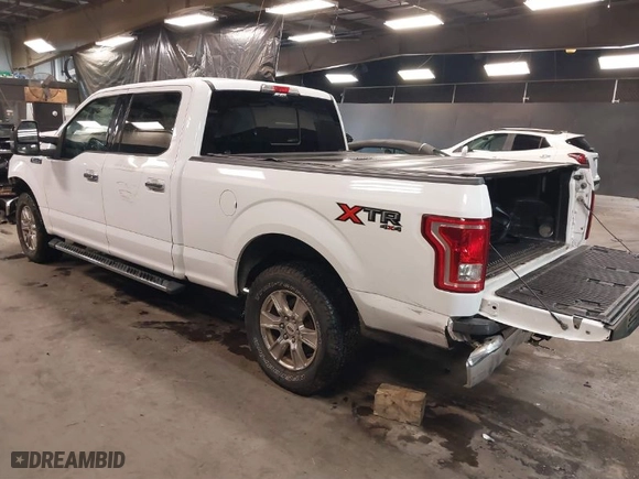 2015 Ford F-150 XLT w/HD Payload Pkg with VIN 1FTFW1EF8FKF09732, listed as a IAAI auction lot 41064468 with 105,340 mi miles. Bid and sale history available at carsss.com. Image 3.