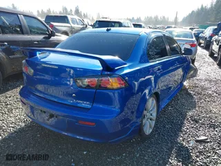 2011 Mitsubishi Lancer ES with VIN JA32U2FU8BU042901, listed as a IAAI auction lot 41450601 with 161,129 mi miles. Bid and sale history available at carsss.com. Image 4.