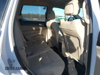 2019 Jeep Grand Cherokee Laredo E with VIN 1C4RJFAG7KC694674, listed as a IAAI auction lot 41591678 with 61,144 mi miles. Bid and sale history available at carsss.com. Image 8.