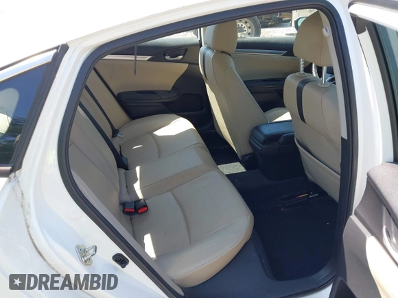 2018 Honda Civic EX-L with VIN 19XFC1F72JE002269, listed as a IAAI auction lot 41973885 with 130,979 mi miles and . Bid and sale history available at DreamBid. Image 8.