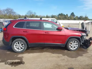 2014 Jeep Cherokee Latitude with VIN 1C4PJLCB1EW208600, listed as a IAAI auction lot 41732264 with 84,718 mi miles. Bid and sale history available at carsss.com. Image 13.
