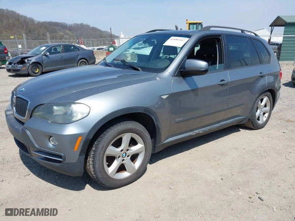 2007 BMW X5 3.0si with VIN 5UXFE43557L013585, listed as a IAAI auction lot 42081447 with 0 mi miles. Bid and sale history available at carsss.com. Image 2.