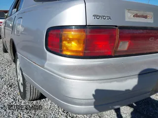 1994 Toyota Camry LE with VIN 4T1SK12E9RU351895, listed as a IAAI auction lot 41239573 with 184,866 mi miles. Bid and sale history available at carsss.com. Image 14.