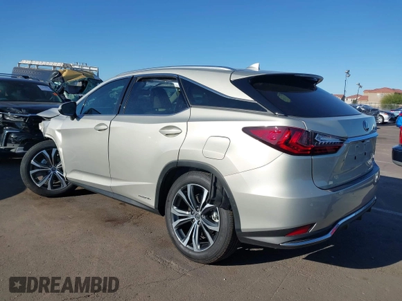2021 Lexus RX 450h with VIN 2T2HGMDA0MC067228, listed as a IAAI auction lot 41818836 with 28,850 mi miles and . Bid and sale history available at DreamBid. Image 3.