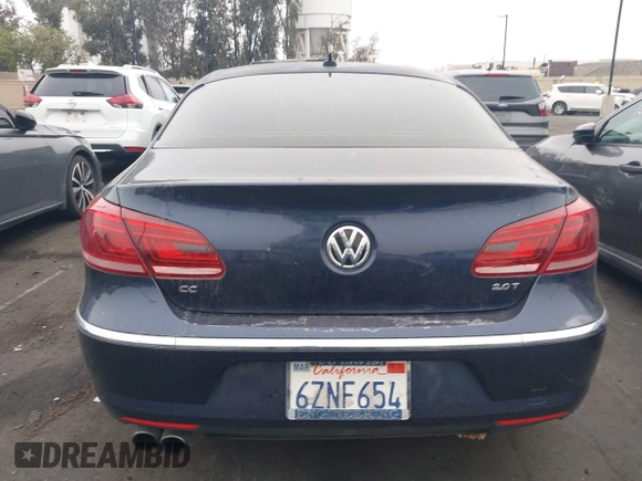2013 Volkswagen CC Sport Plus z VIN WVWBP7AN4DE550513, wystawiony jako IAAI lot #42417922 z przebiegiem Nie podano mil oraz . Historia ofert i sprzedaży dostępna na DreamBid. Obrazek 13.