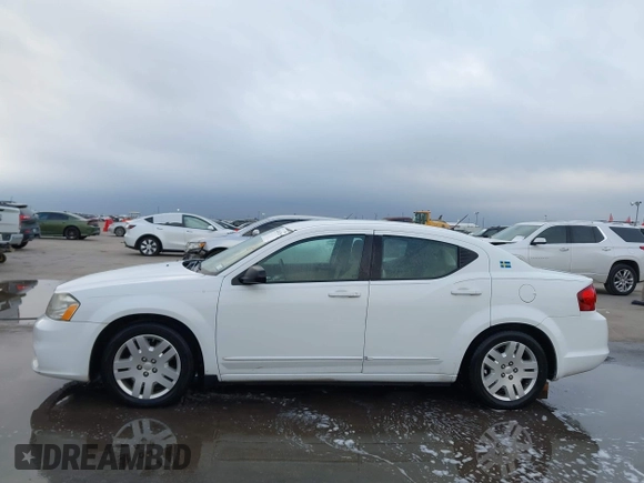 2012 Dodge Avenger SE with VIN 1C3CDZAG1CN251932, listed as a IAAI auction lot 41161291 with 95,481 mi miles and . Bid and sale history available at DreamBid. Image 14.
