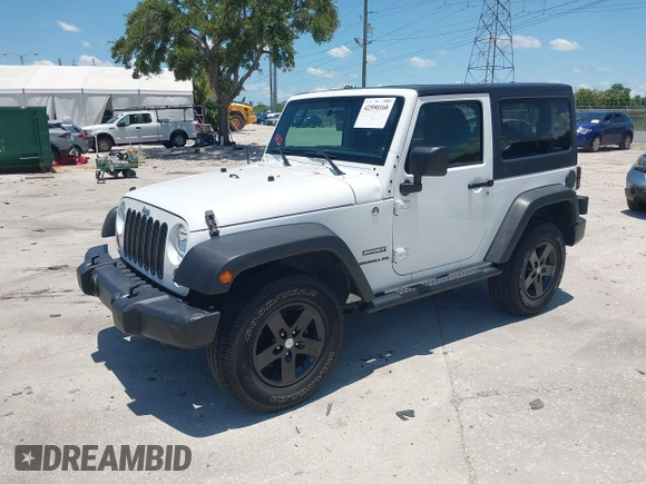 2013 Jeep Wrangler Sport with VIN 1C4AJWAG0DL542624, listed as a IAAI auction lot 42590160 with 54,850 mi miles and . Bid and sale history available at DreamBid. Image 2.