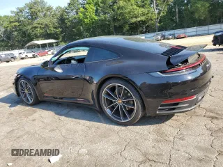 2021 Porsche 911 Carrera with VIN WP0AA2A93MS206806, listed as a Copart auction lot 58923294 with 25,088 mi miles and Salvage Title. Bid and sale history available at carsss.com. Image 2.