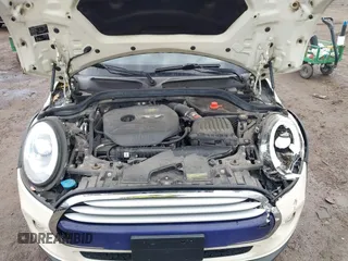 2015 MINI Hardtop 4 Door with VIN WMWXS5C52FT831291, listed as a IAAI auction lot 42179801 with 63,261 mi miles and . Bid and sale history available at DreamBid. Image 10.