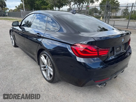 2020 BMW 4 Series 430i with VIN WBA4J1C04LBU67797, listed as a Copart auction lot 44953505 with 48,124 mi miles and Salvage title. Bid and sale history available at DreamBid. Image 2.