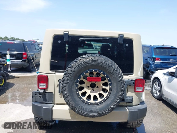 2018 Jeep Wrangler Sahara z VIN 1C4AJWBGXJL811092, wystawiony jako IAAI lot #42305620 z przebiegiem 41 021 mil mil oraz . Historia ofert i sprzedaży dostępna na DreamBid. Obrazek 16.