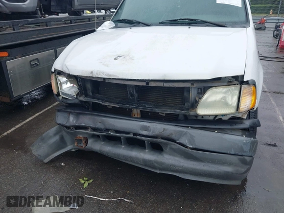 2002 Ford F-150 XL with VIN 1FTRF17242NB86232, listed as a IAAI auction lot 42336859 with 119,321 mi miles and . Bid and sale history available at DreamBid. Image 6.