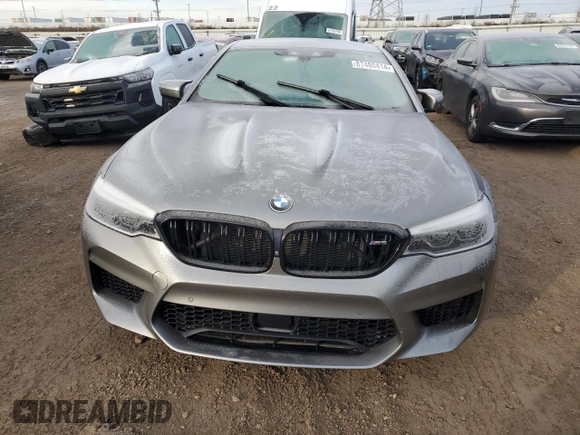 2018 BMW M5 z VIN WBSJF0C56JB282184, wystawiony jako Copart lot #87480414 z przebiegiem Nie podano mil oraz Szkody całkowita. Historia ofert i sprzedaży dostępna na DreamBid. Obrazek 5.
