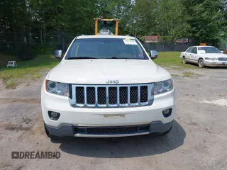 2011 Jeep Grand Cherokee Overland with VIN 1J4RR6GG3BC587857, listed as a IAAI auction lot 42879845 with 165,572 mi miles and . Bid and sale history available at DreamBid. Image 12.