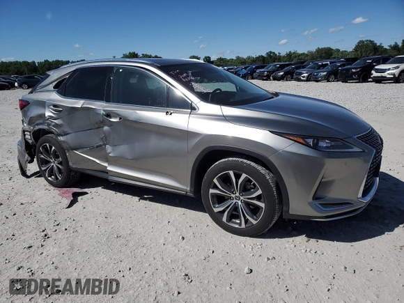 2021 Lexus RX 350 with VIN 2T2HZMDA0MC260229, listed as a Copart auction lot 57242465 with 51,051 mi miles and Salvage title. Bid and sale history available at DreamBid. Image 4.