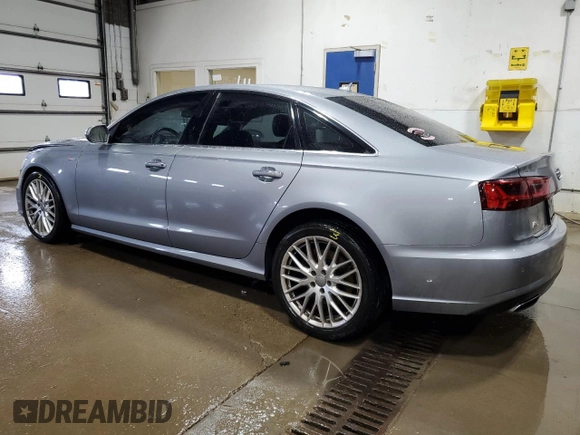 2016 Audi A6 Prestige z VIN WAUHGAFC1GN080778, wystawiony jako Copart lot #60999185 z przebiegiem 62 447 mil mil oraz Szkoda całkowita • Salvage title. Historia ofert i sprzedaży dostępna na DreamBid. Obrazek 2.