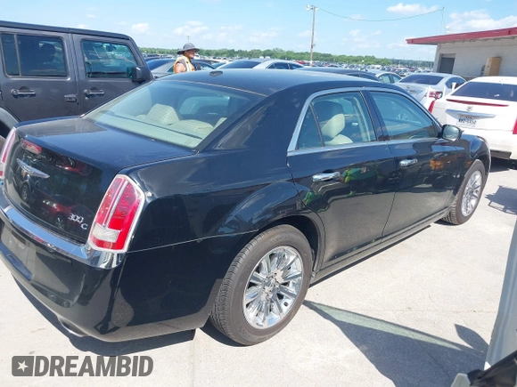 2013 Chrysler 300 with VIN 2C3CCAET5DH650221, listed as a IAAI auction lot 42071848 with 1 mi miles. Bid and sale history available at carsss.com. Image 4.