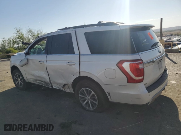 2018 Ford Expedition XLT with VIN 1FMJU1JT5JEA39237, listed as a Copart auction lot 52947615 with 113,676 mi miles and Salvage title. Bid and sale history available at DreamBid. Image 2.