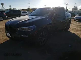 2020 BMW X6 xDrive40i z VIN 5UXCY6C03L9D00816, wystawiony jako Copart lot #76538674 z przebiegiem Nie podano mil oraz Szkoda całkowita • Salvage title. Historia ofert i sprzedaży dostępna na DreamBid. Obrazek 12.