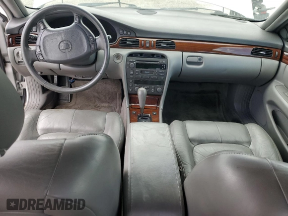2003 Cadillac Seville Luxury SLS z VIN 1G6KS54Y53U262581, wystawiony jako Copart lot #55597595 z przebiegiem 80 832 mil mil oraz Szkoda całkowita • Salvage title. Historia ofert i sprzedaży dostępna na DreamBid. Obrazek 8.