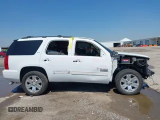 2011 GMC Yukon SLT z VIN 1GKS1CE00BR210794, wystawiony jako IAAI lot #41958998 z przebiegiem 225 407 mil mil oraz . Historia ofert i sprzedaży dostępna na DreamBid. Obrazek 14.