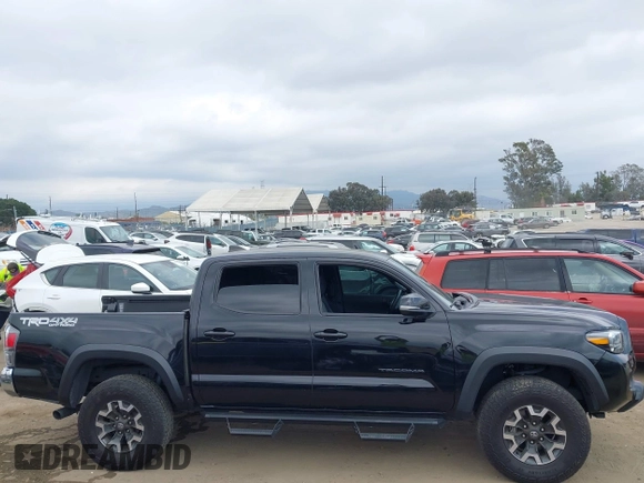 2023 Toyota Tacoma SR z VIN 3TMCZ5AN4PM548729, wystawiony jako IAAI lot #42078723 z przebiegiem 30 966 mil mil oraz . Historia ofert i sprzedaży dostępna na DreamBid. Obrazek 12.